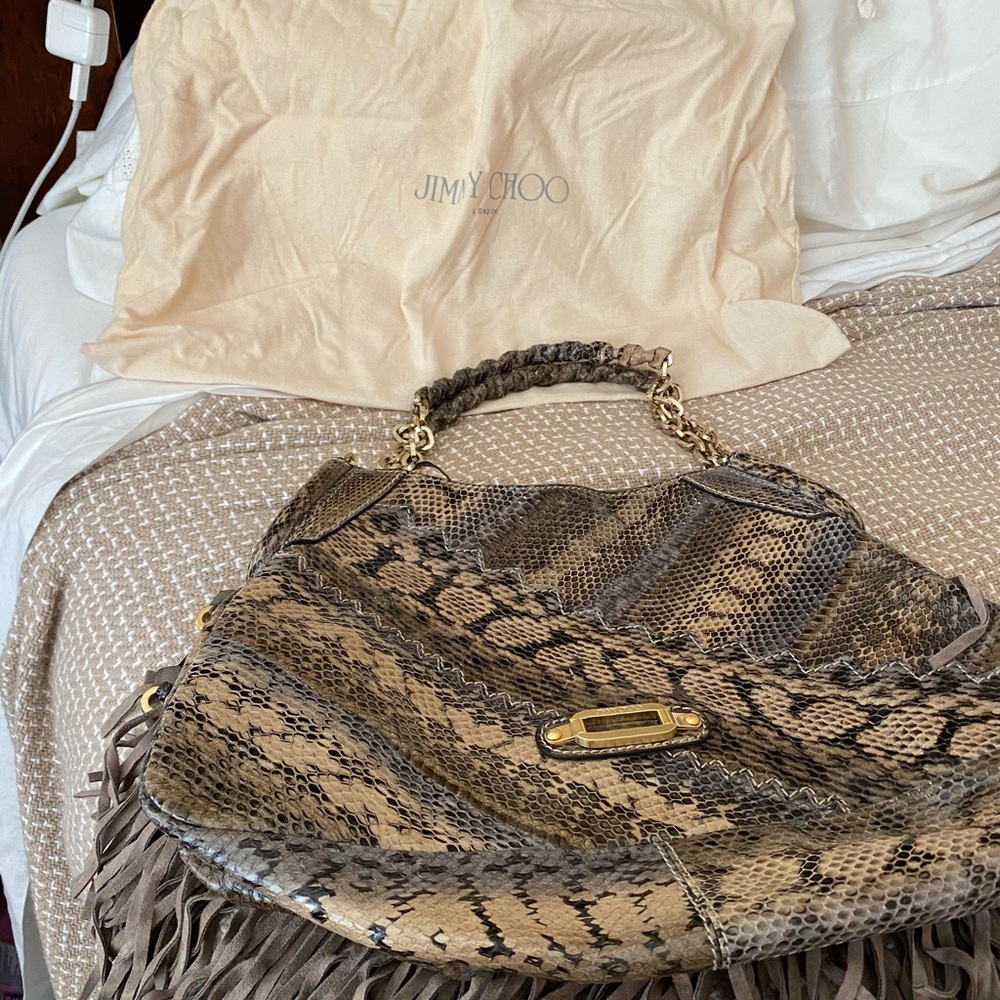 Jimmy choo snake skin purse.